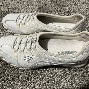 Skechers Women's White Slip-On Sneakers